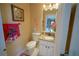 Clean bathroom with granite countertop and flamingo decor at 2831 Sw 139Th St, Ocala, FL 34473