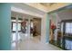 Elegant entryway with mirrors and decorative accents leading to the dining room at 2831 Sw 139Th St, Ocala, FL 34473