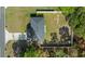 Aerial view of a house with a fenced backyard at 307 Marion Oaks Pass, Ocala, FL 34473