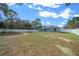 Spacious backyard with a new home and white fence at 307 Marion Oaks Pass, Ocala, FL 34473