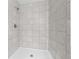 Large tiled shower with neutral color scheme at 307 Marion Oaks Pass, Ocala, FL 34473