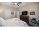 Guest bedroom with a queen-size bed and a flat-screen TV at 4074 Sw 47Th Ct, Ocala, FL 34474