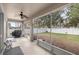 Spacious screened porch overlooking the backyard at 4074 Sw 47Th Ct, Ocala, FL 34474