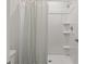 Bathroom with shower, and striped shower curtain at 415 Malauka Radl, Ocklawaha, FL 32179