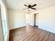 Spacious bedroom with hardwood floors and closet at 4310 Se 139Th Pl, Summerfield, FL 34491