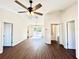 Open living space with hardwood floors and multiple entry points at 4310 Se 139Th Pl, Summerfield, FL 34491