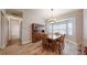 Dining room with hardwood floors and built-in hutch at 4475 Se 48Th Place Rd, Ocala, FL 34480