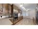 Modern kitchen with stainless steel appliances and wood cabinets at 4475 Se 48Th Place Rd, Ocala, FL 34480