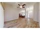 Bright living room features hardwood floors and a high ceiling at 4475 Se 48Th Place Rd, Ocala, FL 34480