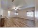 Large living area with wood-look floors and natural light at 4475 Se 48Th Place Rd, Ocala, FL 34480