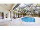 Inviting screened pool with plenty of space for swimming and sunbathing at 4475 Se 48Th Place Rd, Ocala, FL 34480