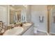 Elegant bathroom with double sinks and a shower at 4748 Nw 39Th Street Rd, Ocala, FL 34482