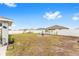 Large backyard with fire pit and playground at 5050 Sw 91 Pl, Ocala, FL 34476