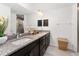 Elegant bathroom with double vanity and granite countertop at 5050 Sw 91 Pl, Ocala, FL 34476