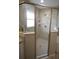 Bathroom with walk-in shower and tile surround at 6725 Sw 64Th Ave, Ocala, FL 34476