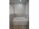 Bathroom with large soaking tub and tile surround at 6725 Sw 64Th Ave, Ocala, FL 34476