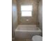 Clean bathroom with a shower/tub combo at 6725 Sw 64Th Ave, Ocala, FL 34476