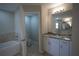 Bathroom with granite countertop, bathtub, and toilet at 6725 Sw 64Th Ave, Ocala, FL 34476