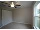 Well-lit bedroom with double door closet and large window at 6725 Sw 64Th Ave, Ocala, FL 34476