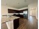 Modern kitchen with stainless steel appliances and granite countertops at 7208 Sw 61St Sw Pl, Ocala, FL 34474