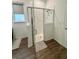 Modern walk-in shower with glass enclosure and neutral tile at 7208 Sw 61St Sw Pl, Ocala, FL 34474