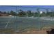 Outdoor basketball court with multiple hoops and chain link fence at 726 Marion Oaks Ln, Ocala, FL 34473