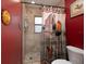 Bathroom with shower stall, tile flooring, and a rustic decor at 726 Marion Oaks Ln, Ocala, FL 34473