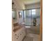 Bathroom with shower/tub combo, toilet, and vanity at 8569 Sw 92Nd Ln # F, Ocala, FL 34481