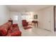 Cozy living room with a comfortable sofa, armchair, and ample natural light at 8569 Sw 92Nd Ln # F, Ocala, FL 34481