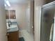 Bathroom with vanity, shower, and toilet at 9581 Se 168Th Elderberry Pl, The Villages, FL 32162