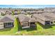 Aerial view of houses with screened porches and lush lawns at 9661 Sw 63Rd Loop, Ocala, FL 34481