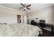 Comfortable bedroom with a desk and access to bathroom at 9661 Sw 63Rd Loop, Ocala, FL 34481