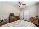 Well-lit bedroom with double closets and a dresser at 9661 Sw 63Rd Loop, Ocala, FL 34481