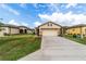 One-story house with attached garage and nicely landscaped yard at 9661 Sw 63Rd Loop, Ocala, FL 34481