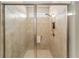 Spacious walk-in shower with tiled walls at 9661 Sw 63Rd Loop, Ocala, FL 34481