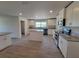 White kitchen with island and stainless steel appliances at 9727 Sw 125Th Court Rd, Dunnellon, FL 34432