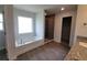 Bathroom featuring a soaking tub, walk-in shower, and granite countertops at 12295 Sw 90Th Pl, Dunnellon, FL 34432