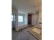 Bathroom featuring double sinks, a walk-in shower, and a soaking tub at 12295 Sw 90Th Pl, Dunnellon, FL 34432