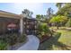 Peaceful backyard oasis with a screened-in patio and lush landscaping at 12750 Se 119Th Ct, Ocklawaha, FL 32179