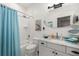 Clean bathroom with a tub shower combination and updated vanity at 12750 Se 119Th Ct, Ocklawaha, FL 32179