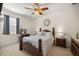 Bright bedroom featuring a wooden bed frame and ample natural light at 12750 Se 119Th Ct, Ocklawaha, FL 32179