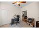 Home office with built-in shelving and plenty of workspace at 12750 Se 119Th Ct, Ocklawaha, FL 32179