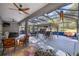 Spacious covered patio with seating area, hot tub, and gazebo at 12750 Se 119Th Ct, Ocklawaha, FL 32179