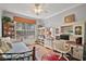 Bedroom with built-in workspace and daybed at 13077 Se 86 Ct, Summerfield, FL 34491