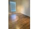 Spacious bedroom with laminate flooring and window blinds at 13410 Sw 3Rd Ct, Ocala, FL 34473