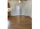 Dining area with wood-look flooring and access to a patio at 13410 Sw 3Rd Ct, Ocala, FL 34473