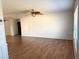 Living room with laminate flooring and ceiling fan at 13410 Sw 3Rd Ct, Ocala, FL 34473