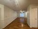 Bright living room with wood-look flooring and a ceiling fan at 13410 Sw 3Rd Ct, Ocala, FL 34473