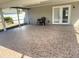 Spacious screened patio with tiled flooring, perfect for outdoor relaxation at 13410 Sw 3Rd Ct, Ocala, FL 34473