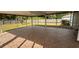 Spacious screened patio with tiled flooring, perfect for relaxing at 13410 Sw 3Rd Ct, Ocala, FL 34473
